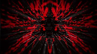 A symmetrical burst of red shards blows outward from the centre, splinters thinning as they reach the black edges of the frame.