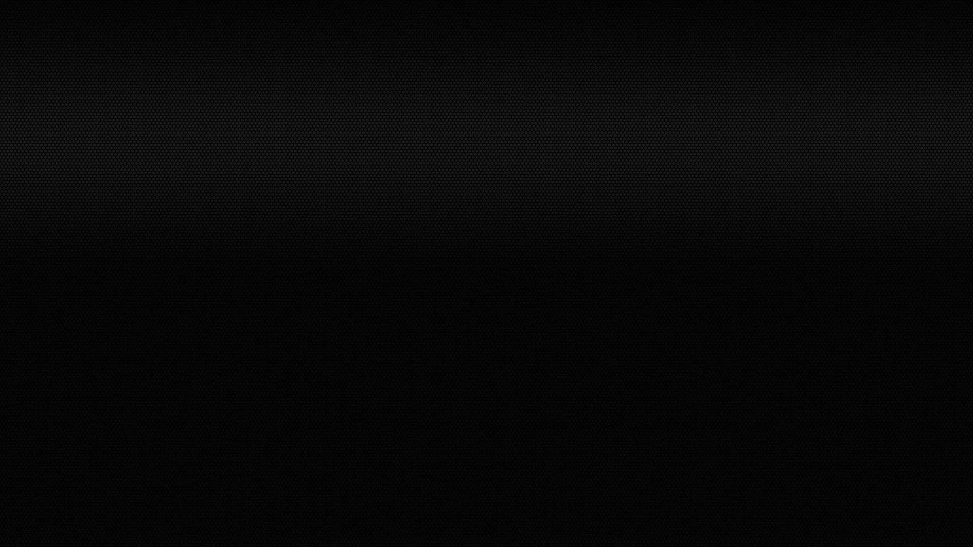 A pale wash of grey sits along the top edge and fades out within a third of the frame, everything below it going flat black.