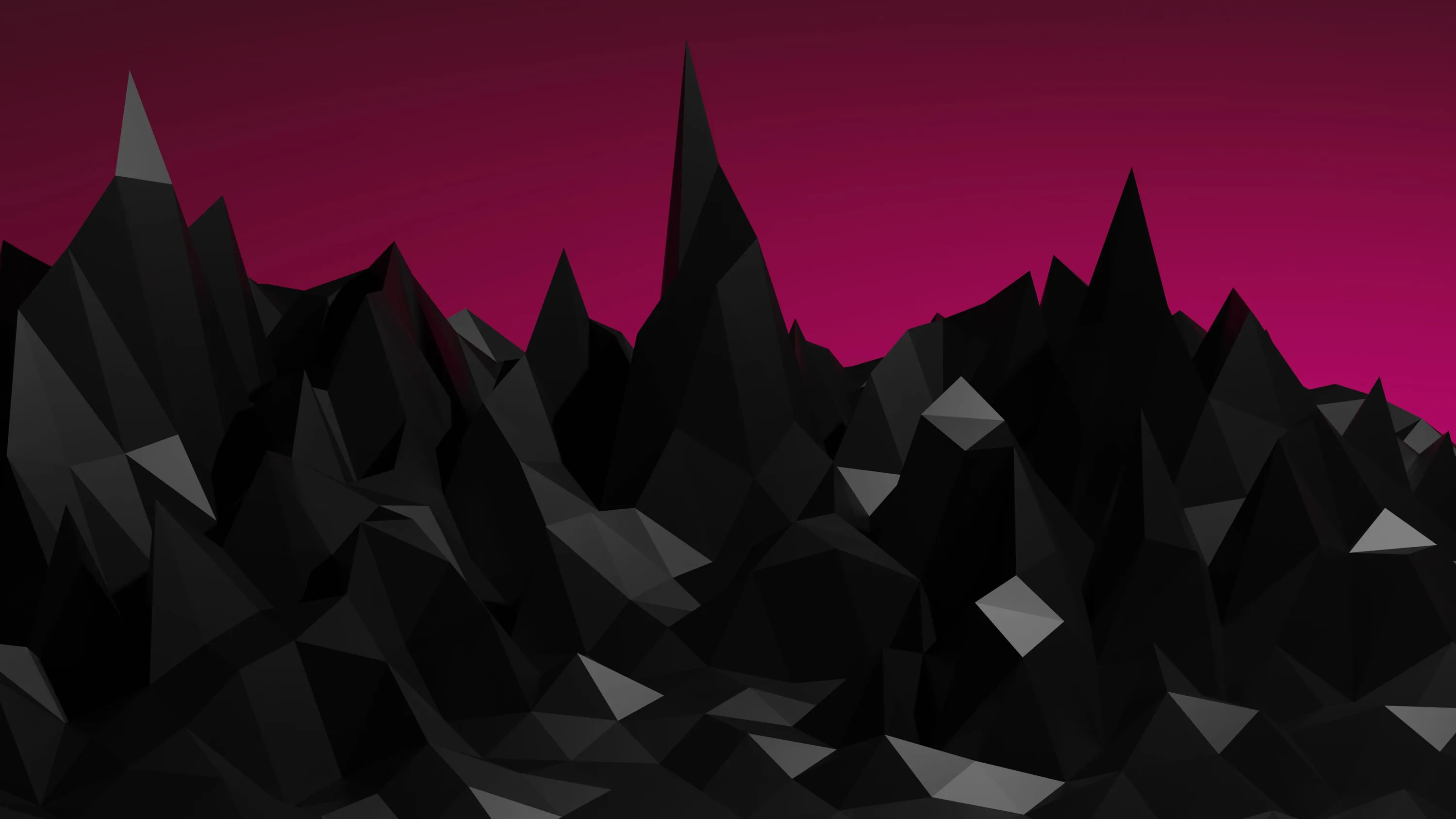 Faceted black peaks cut a jagged line across a deep pink sky, the polygons catching light on their upper faces.