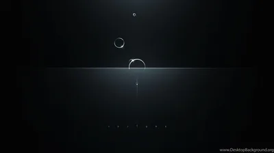Three small bubbles drift upward through near-black water, a thin line of light marking the surface below them.