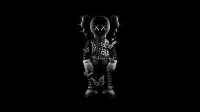 The Companion figure stands centred with gloved hands at its sides, X-marked eyes and body edges catching a faint rim light against pure black.