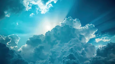 The sun burns through the crown of a cumulus tower, the whole scene graded teal, rays fanning into the upper right corner.