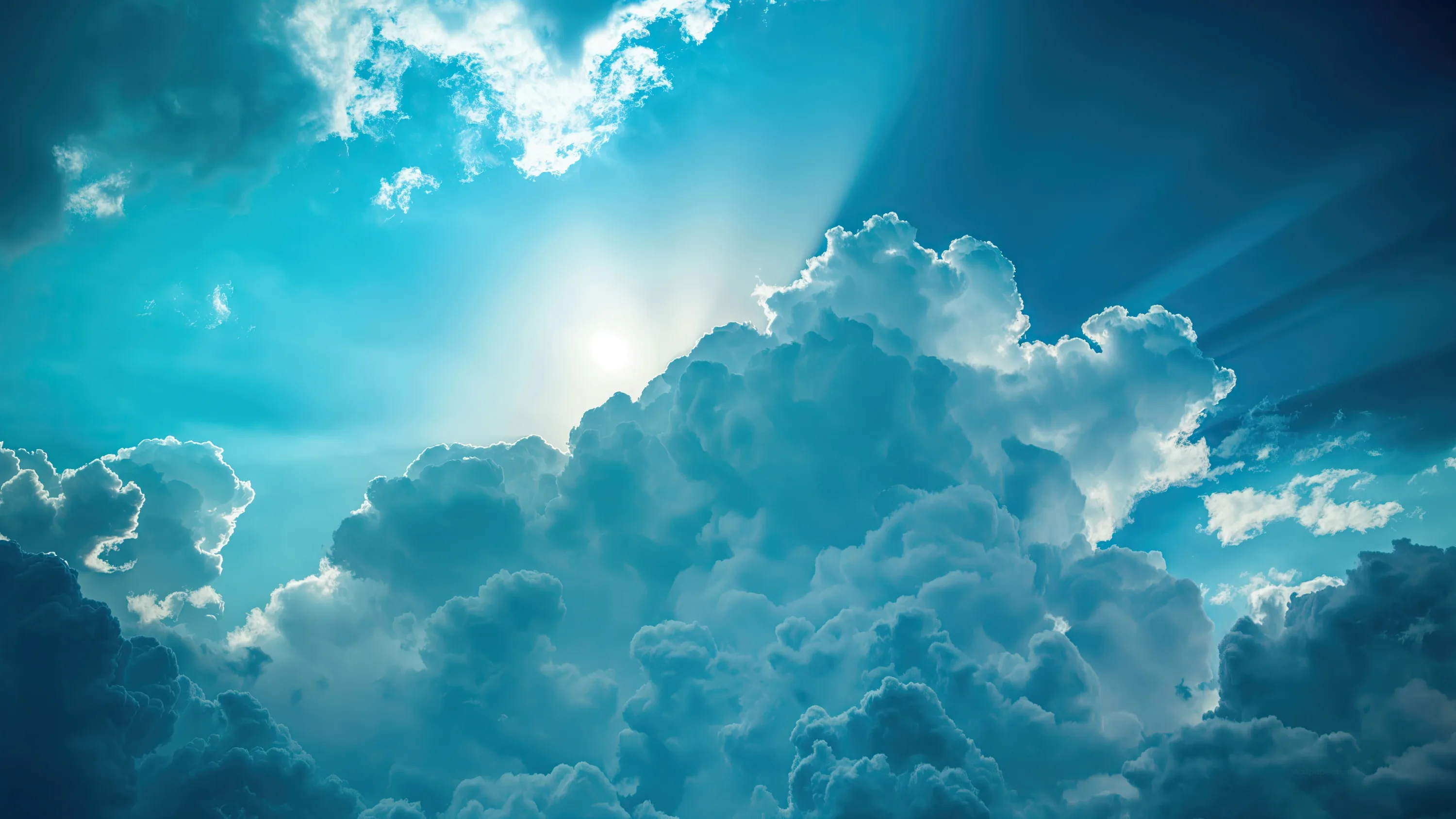 The sun burns through the crown of a cumulus tower, the whole scene graded teal, rays fanning into the upper right corner.