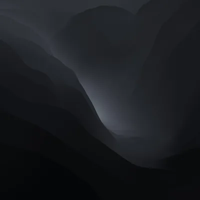 Layered ridgelines fade into fog down a narrow valley, painted in greys so muted the foreground slopes read as pure shadow.
