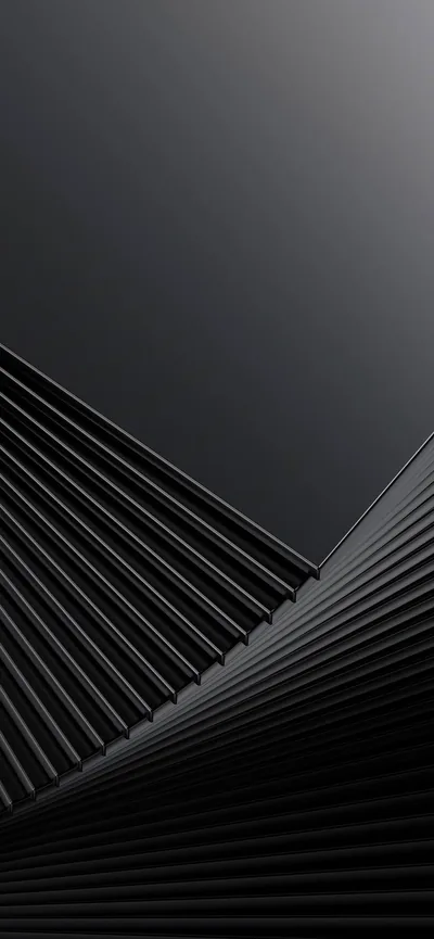 Sharp parallel ridges fan across the lower half of the frame and meet a smooth dark wall above, all in shades of near-black.