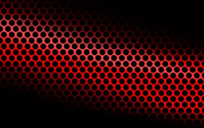 A field of circular perforations lit in red curves across dark metal, the holes fading into black toward the top and bottom edges.