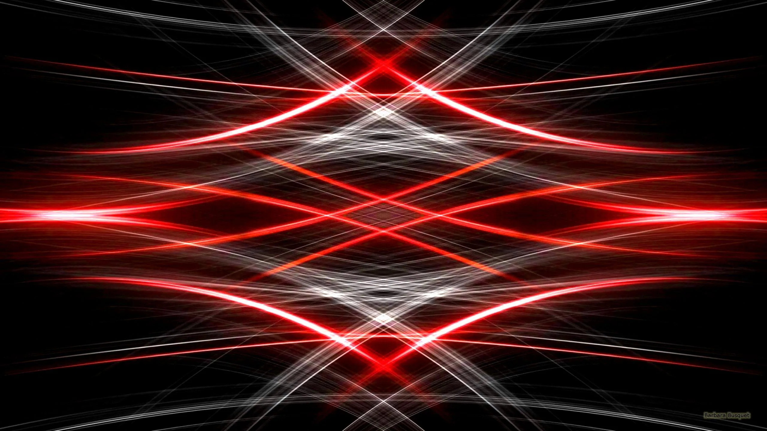Crossing beams of red and white light arc symmetrically over pure black, brightest where the strands meet in the middle.