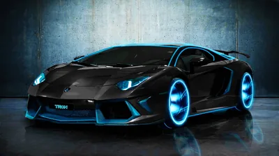 Cyan tubing rings the wheels and runs along every body crease of a black Aventador, the glow reflecting off a rough grey wall behind it.