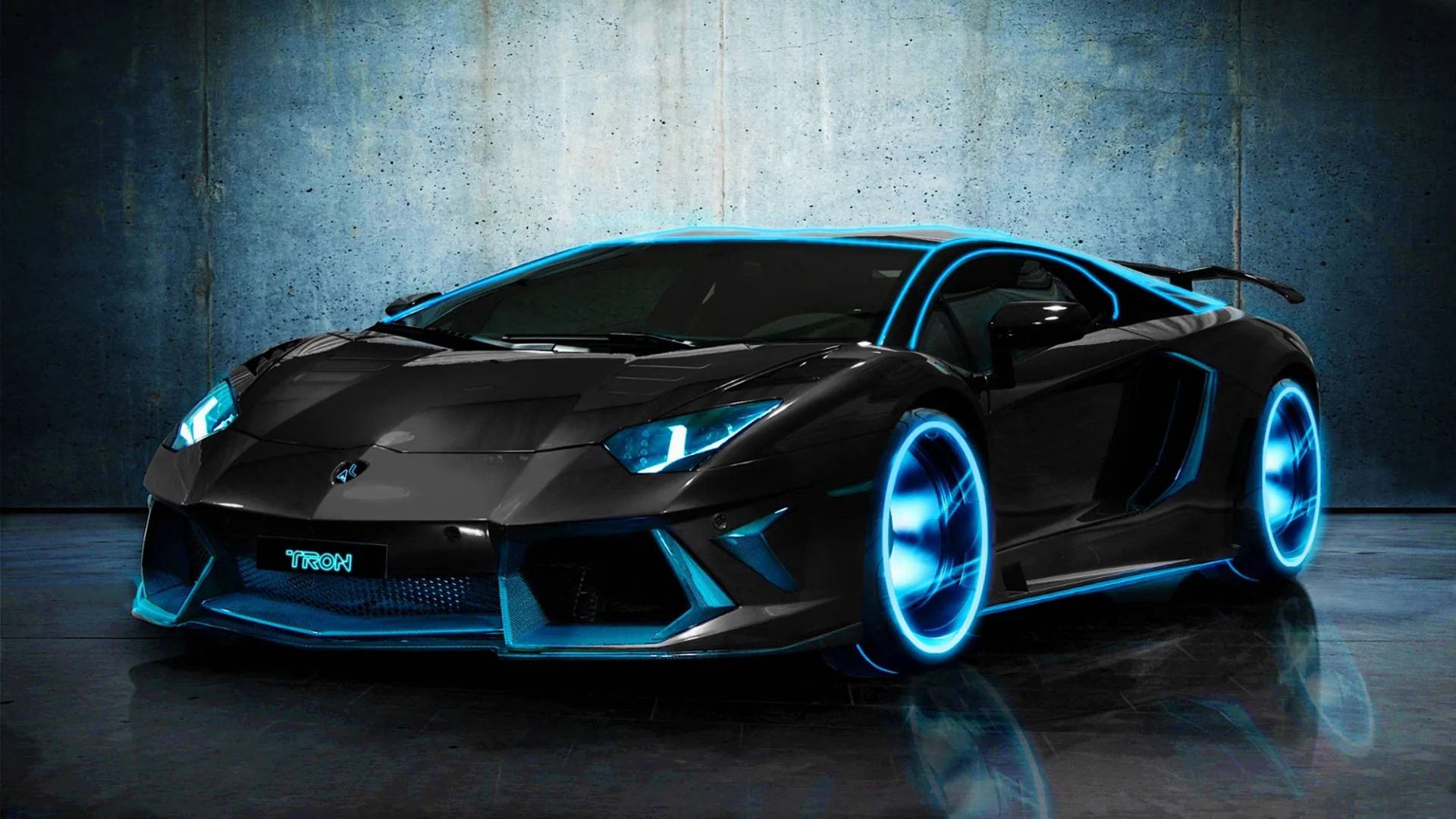 Cyan tubing rings the wheels and runs along every body crease of a black Aventador, the glow reflecting off a rough grey wall behind it.