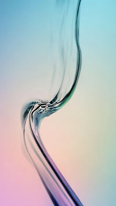 Dark smoke-like strands knot at mid-frame and trail down a pastel gradient of mint, cream and rose, both side edges left clean for app shortcuts.
