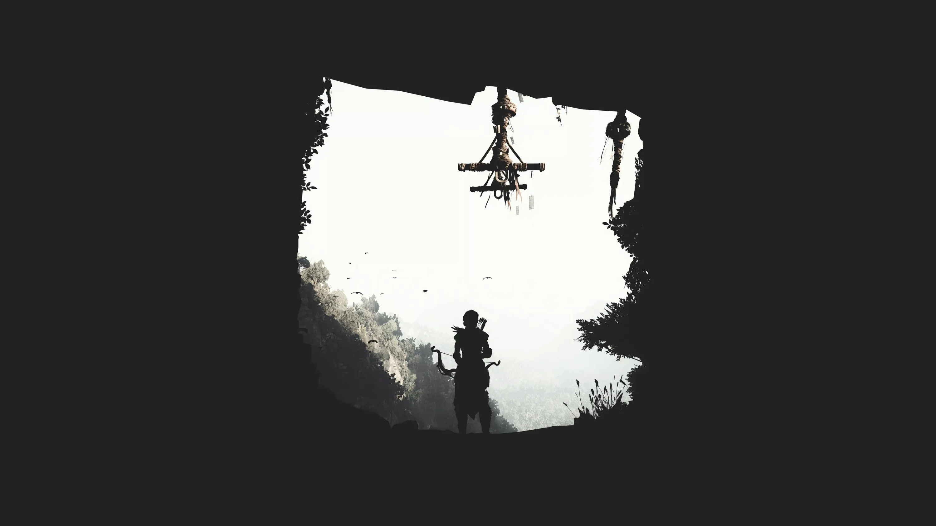 A tiny figure stands in a rough cave mouth, a towering shape crossing the blown-out white sky beyond, everything else pure black.