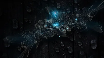 Fragments of metal and glass hang in darkness around a strip of blue light, water droplets scattered across the back plate.