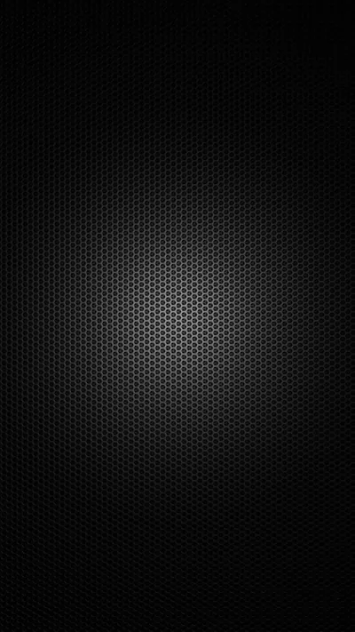 A tight hexagonal weave fills a tall phone frame, lit softly through the middle so the mesh reads as texture before the edges go black.