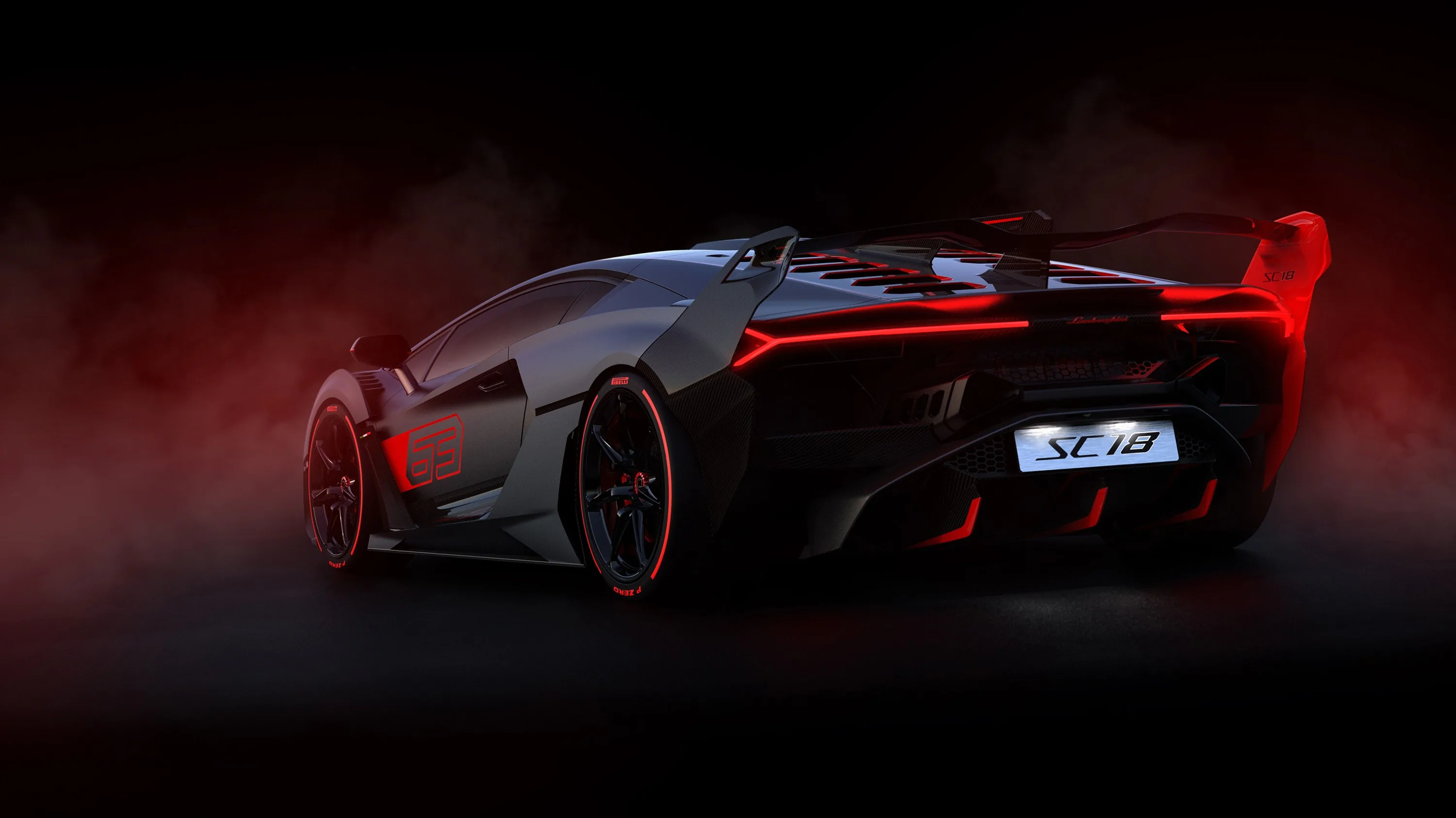 The one-off track car seen from behind in a dark room, red haze catching its tall wing and roof scoop while thin red lines outline every vent.