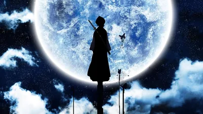 A cloaked figure stands on a rooftop edge, cut to pure silhouette by an enormous moon, with blue-lit clouds banked below.