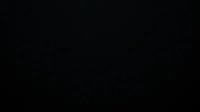 Close to pure black from edge to edge, with only a faint smudge of grey surfacing near the middle — safe for OLED screens.