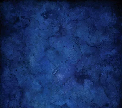 Cloudy royal blue mottling fills the whole frame with no veining at all, edges shading toward black, so icons stay readable anywhere on screen.