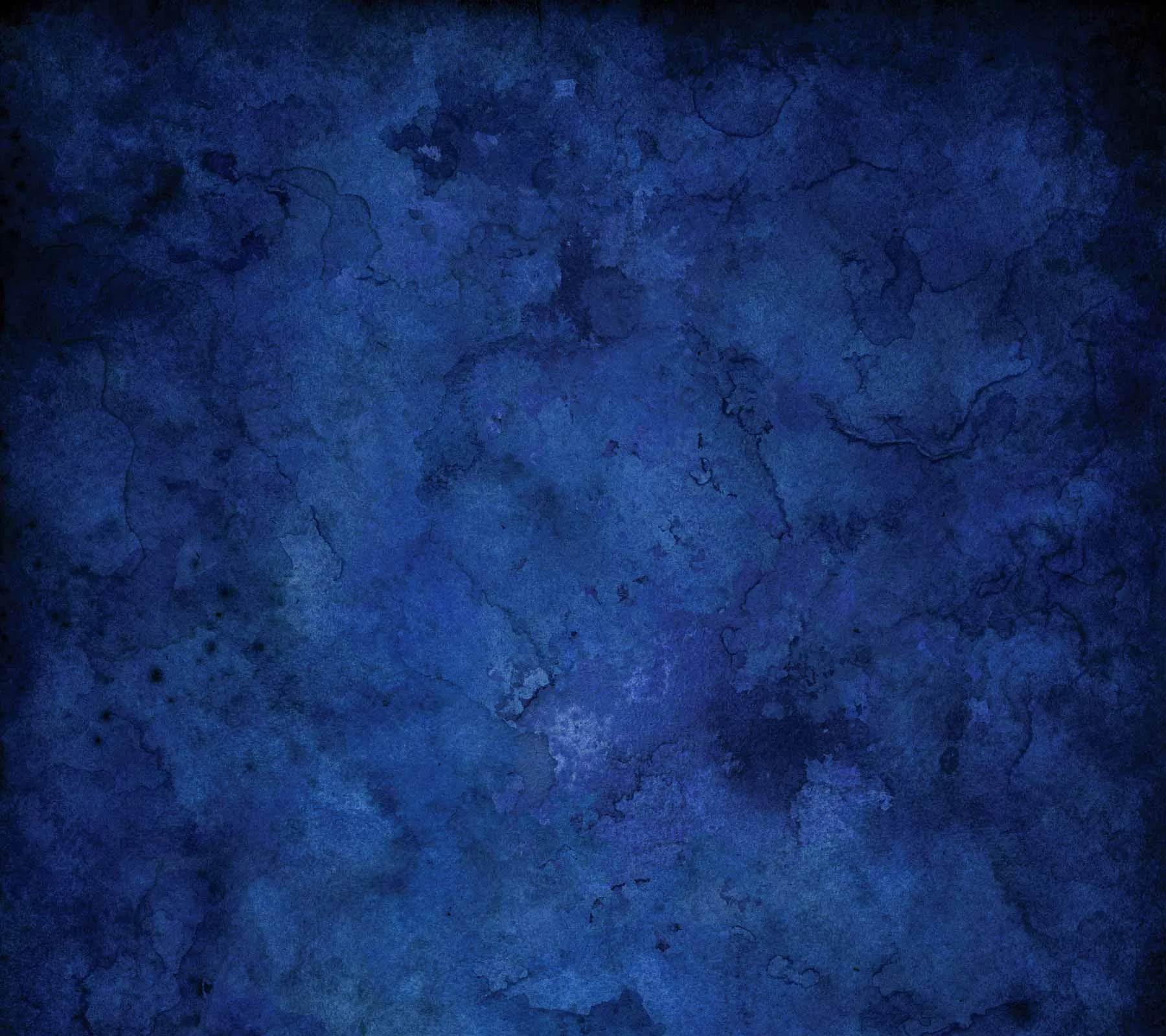 Cloudy royal blue mottling fills the whole frame with no veining at all, edges shading toward black, so icons stay readable anywhere on screen.