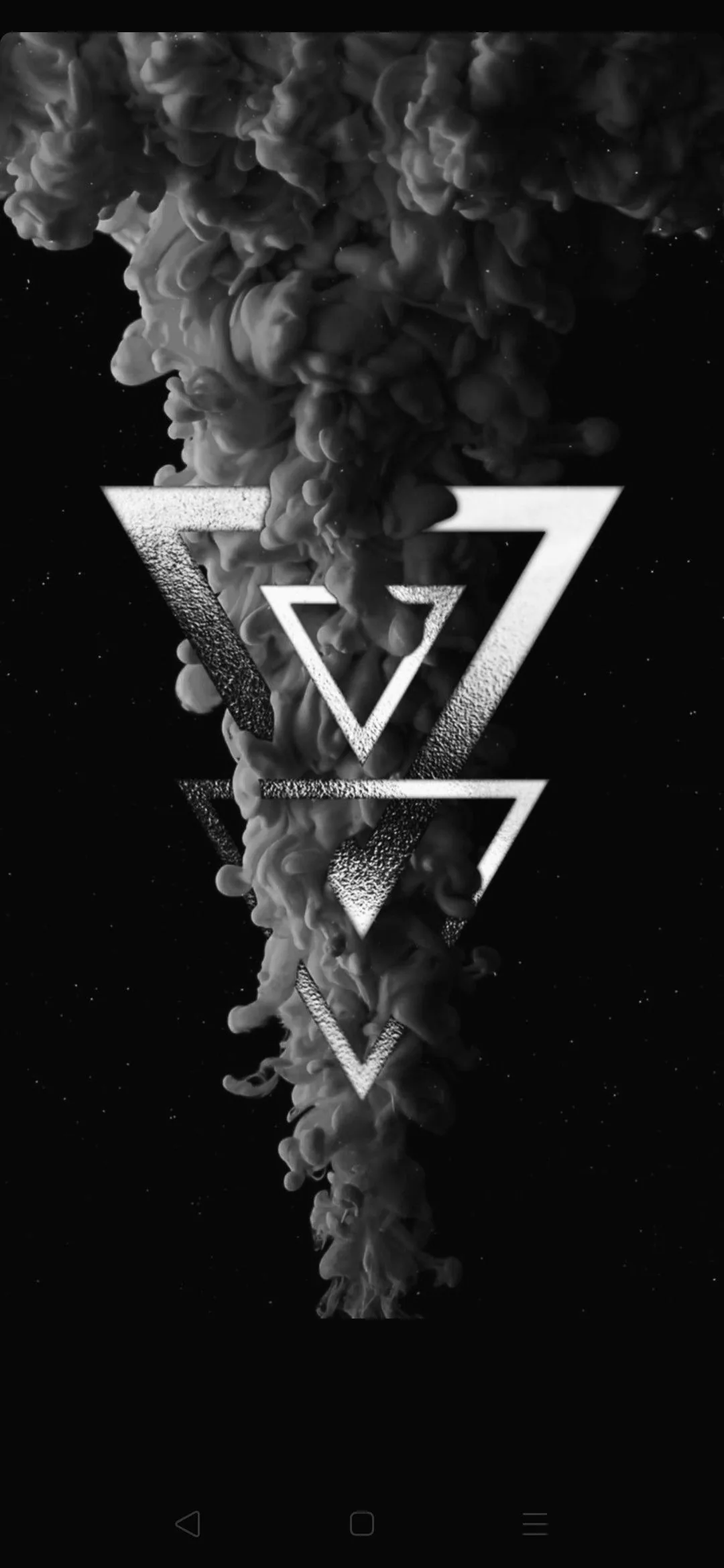 Two outlined triangles overlap at the centre of a column of grey smoke, the shapes crisp and white against the soft billows and the black around them.