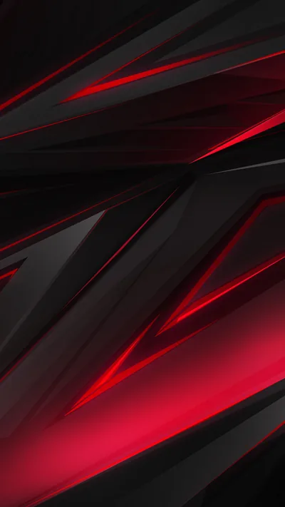 Sharp diagonal planes cross a tall frame in charcoal, split by wedges of red that glow brightest along the lower left.