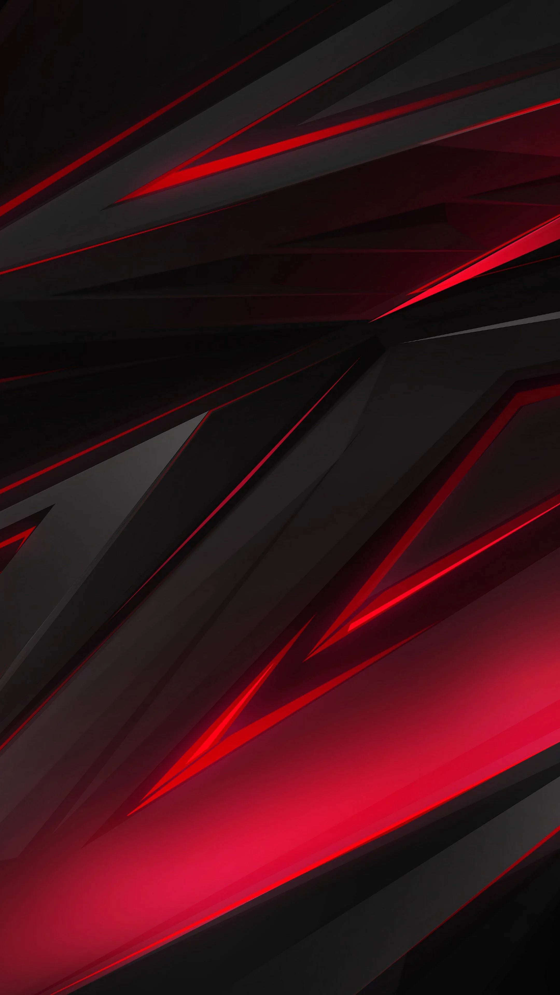 Sharp diagonal planes cross a tall frame in charcoal, split by wedges of red that glow brightest along the lower left.