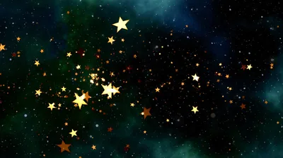 Glossy gold and orange stars cluster toward the left of a teal-green nebula backdrop, leaving the right side quieter for widgets.