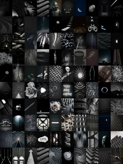 A hundred small dark prints laid out in a tight grid, a crescent moon and a bicycle among the brighter tiles up top.
