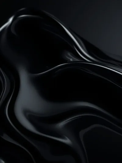 A sheet of black liquid glass ripples into slow waves, thin highlights tracing each crest down the frame.