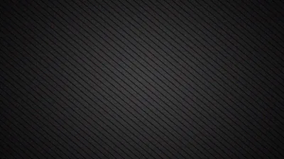 Fine diagonal stripes run corner to corner across a dark grey field, evenly spaced and softly lit.