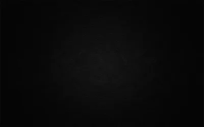 Fine horizontal lines run the width of a matte black panel; a weak grey glow lifts the centre before falling back to black.
