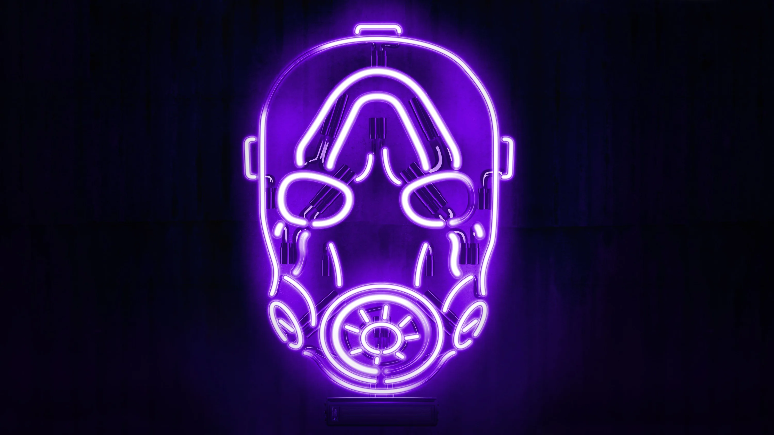 A gas mask traced in purple tube light floats centred on a near-black wall, the filter disc the brightest part of the drawing.