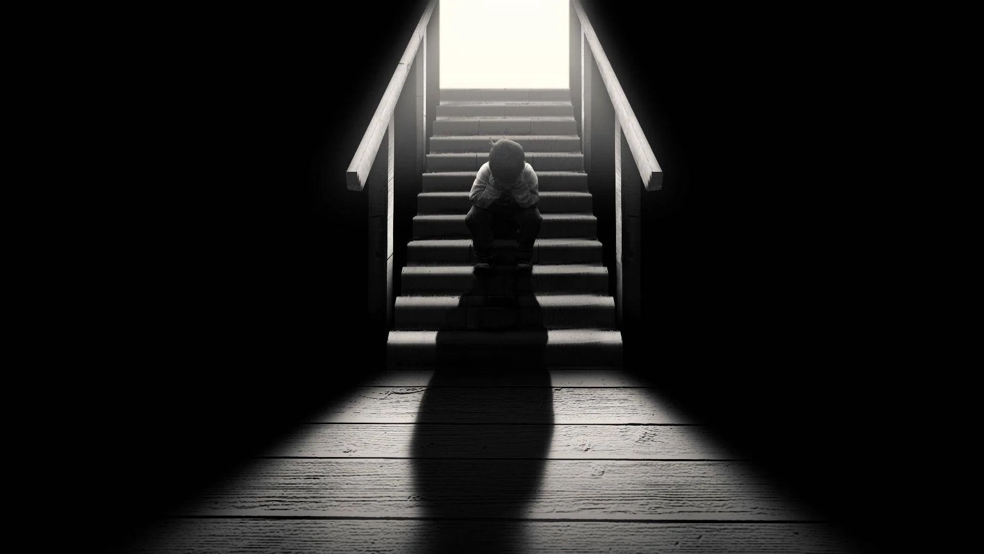 An open door at the top of the stairs throws white light past a slumped figure, and the monochrome floor below fades to black for icons.