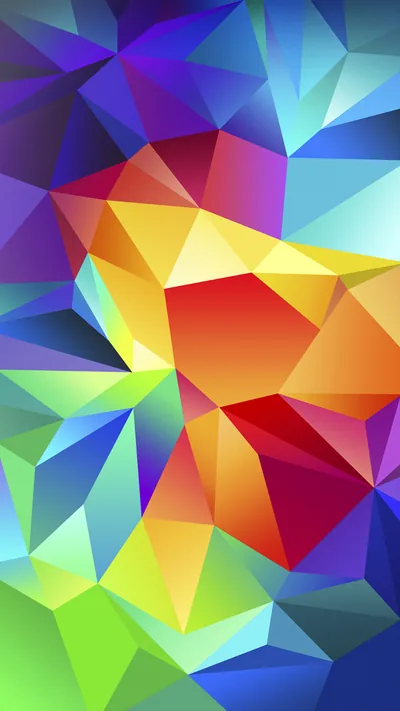 Sharp low-poly triangles pack the whole frame, red and yellow at centre shading to blue and green at the corners; busy behind icons, bold from afar.