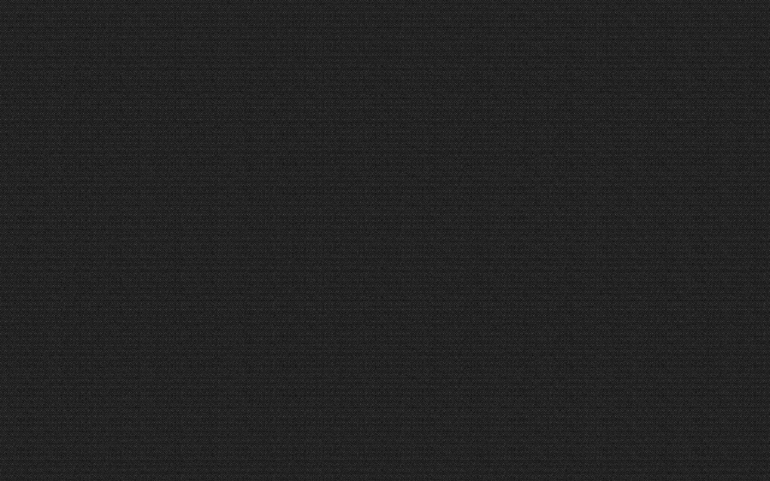 An even charcoal grey fills the whole frame with no gradient and no grain, a flat backdrop that keeps text and icons readable.