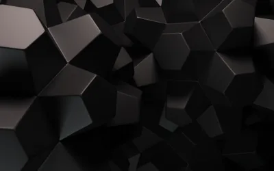 Chunky faceted blocks crowd toward the viewer in matte black, gaps between them opening into deeper shadow near the top edge.