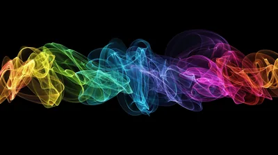 A ribbon of coloured smoke stretches horizontally through the middle of the frame, running from yellow through green and blue into magenta on pure black.
