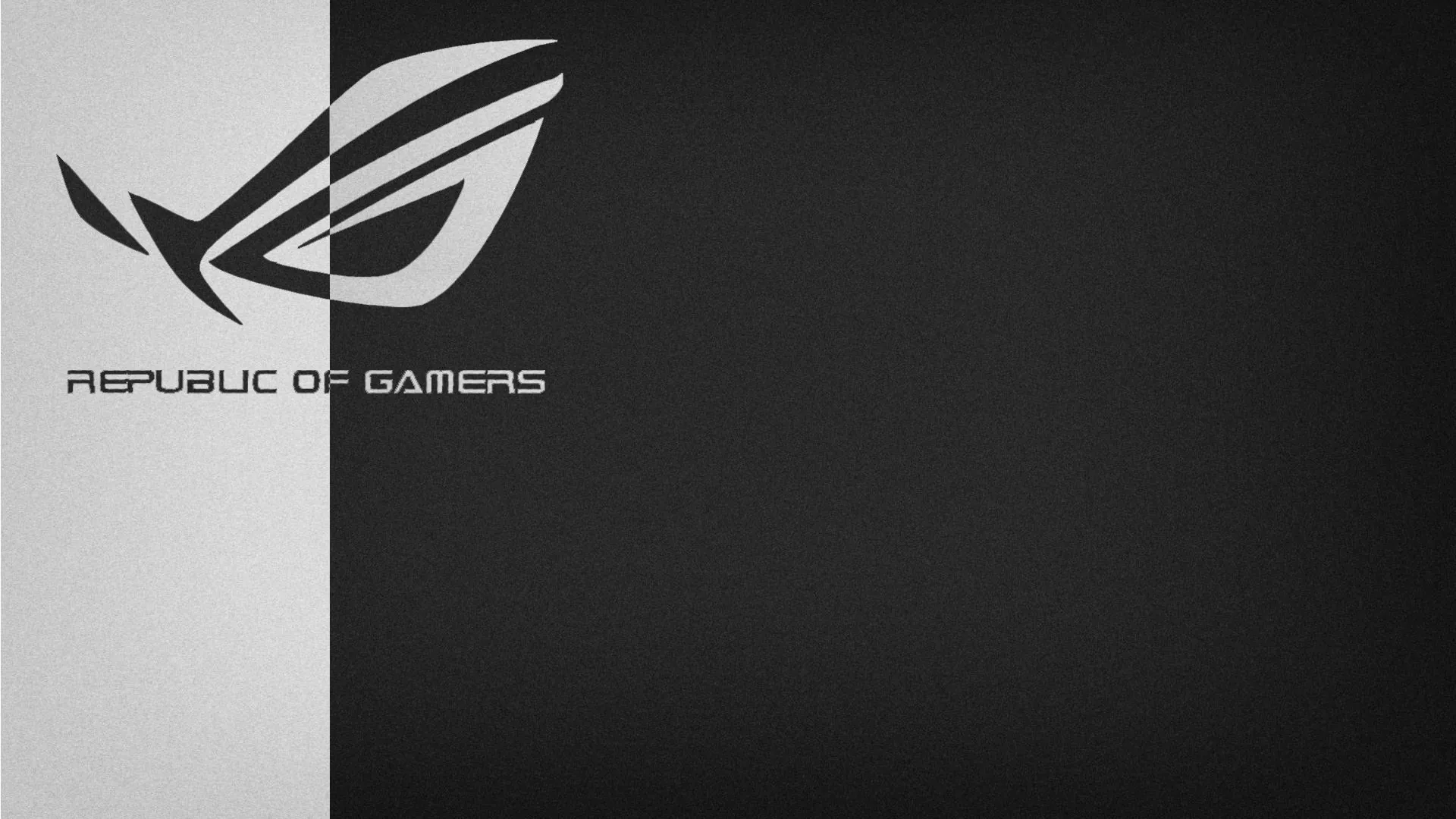 The Republic of Gamers eye and lettering sit on the pale left panel, the right two thirds left as empty dark grey.