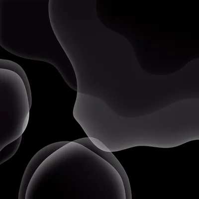 Overlapping translucent shapes drift across a black square, their grey edges catching a little light where two of them cross.