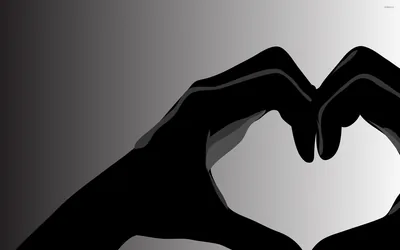 Two hands in flat black silhouette meet to shape a heart, the negative space glowing pale against a soft grey gradient.