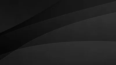 Two long curved panels sweep across a charcoal background, separated by nothing more than a slight shift in tone.