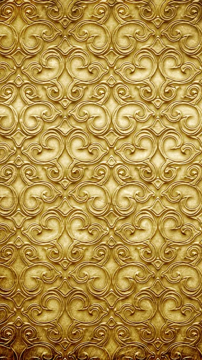 Rows of heart-shaped scrolls pressed into a brassy metal panel, the relief repeating evenly down the phone screen so icons sit cleanly anywhere.