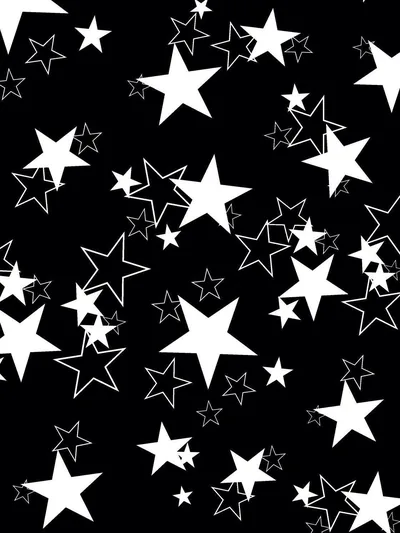 Filled and outlined stars in white tile the full height of the frame on black, packed tighter down the centre than at the edges.