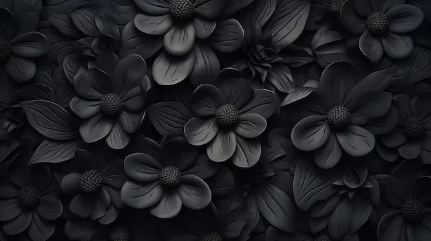 Dozens of dark blooms fill the frame edge to edge, the petals separated only by the shadow between them.