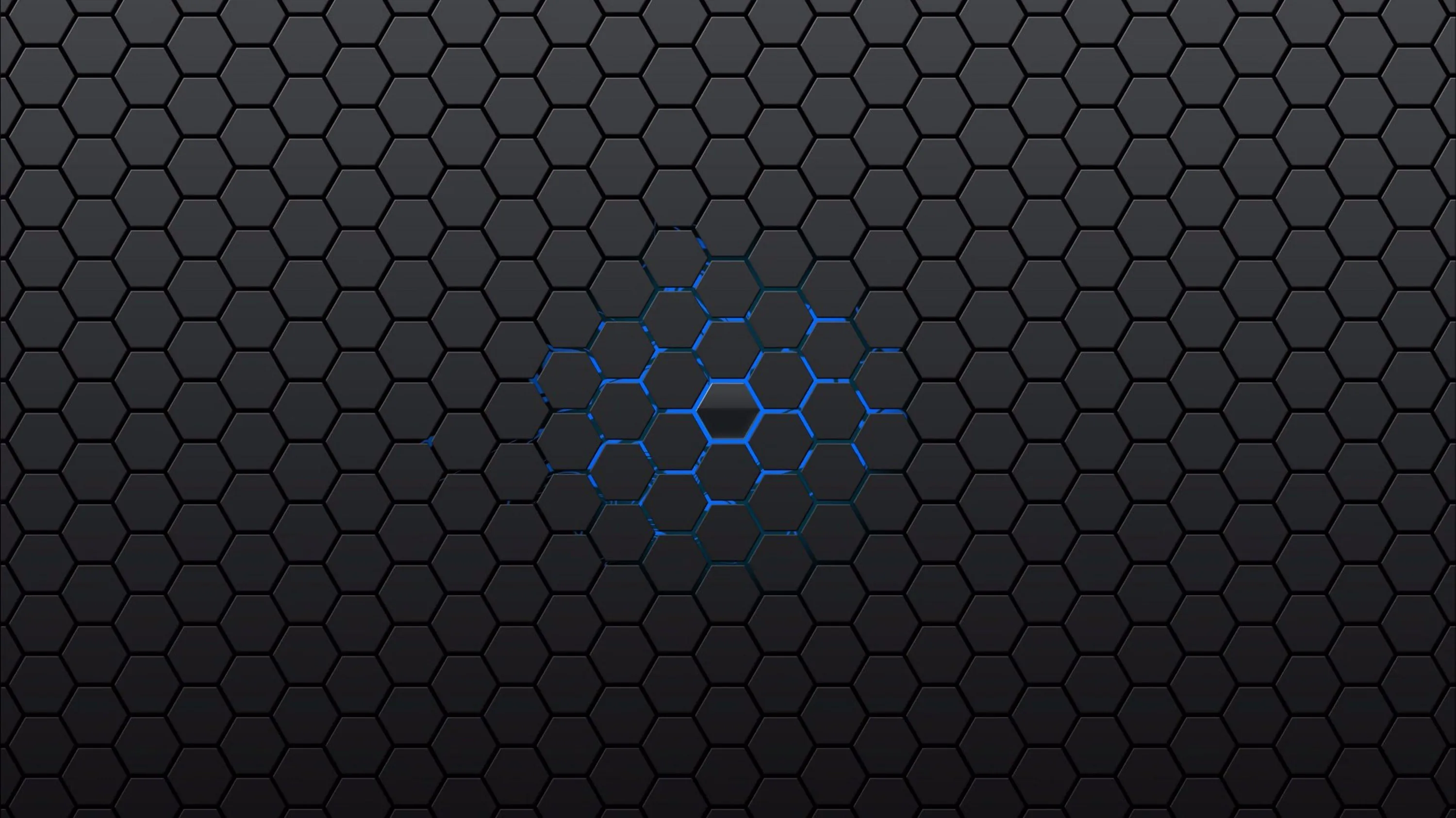 A dark honeycomb grid runs edge to edge with a small cluster of cells glowing blue near the centre.