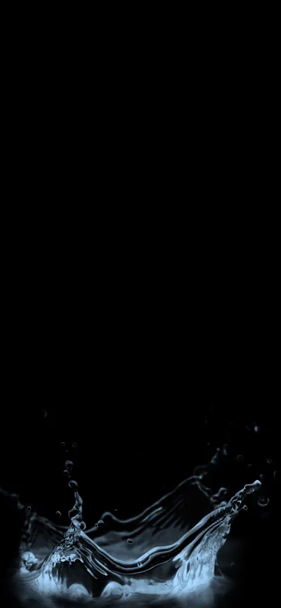 A sheet of water throws up along the lower quarter of the frame, caught mid-flick in pale blue while everything above it stays flat black.