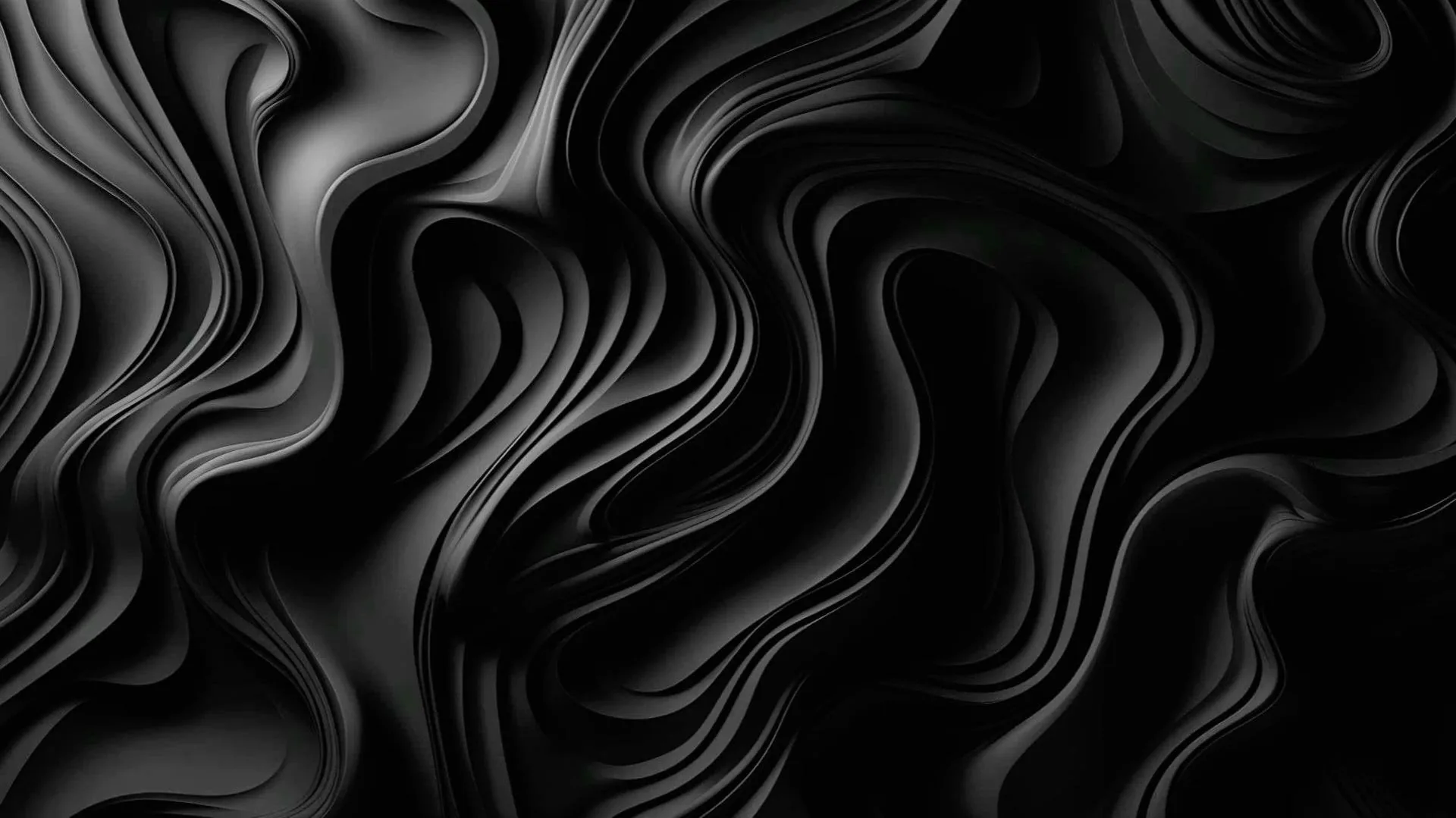 Smooth black folds ripple across the frame like poured ink, thin highlights following each ridge from the upper left.