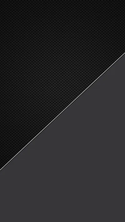 One thin line splits the frame diagonally between a fine carbon dot texture above and flat dark grey below — a two-tone layout that keeps every icon legible.
