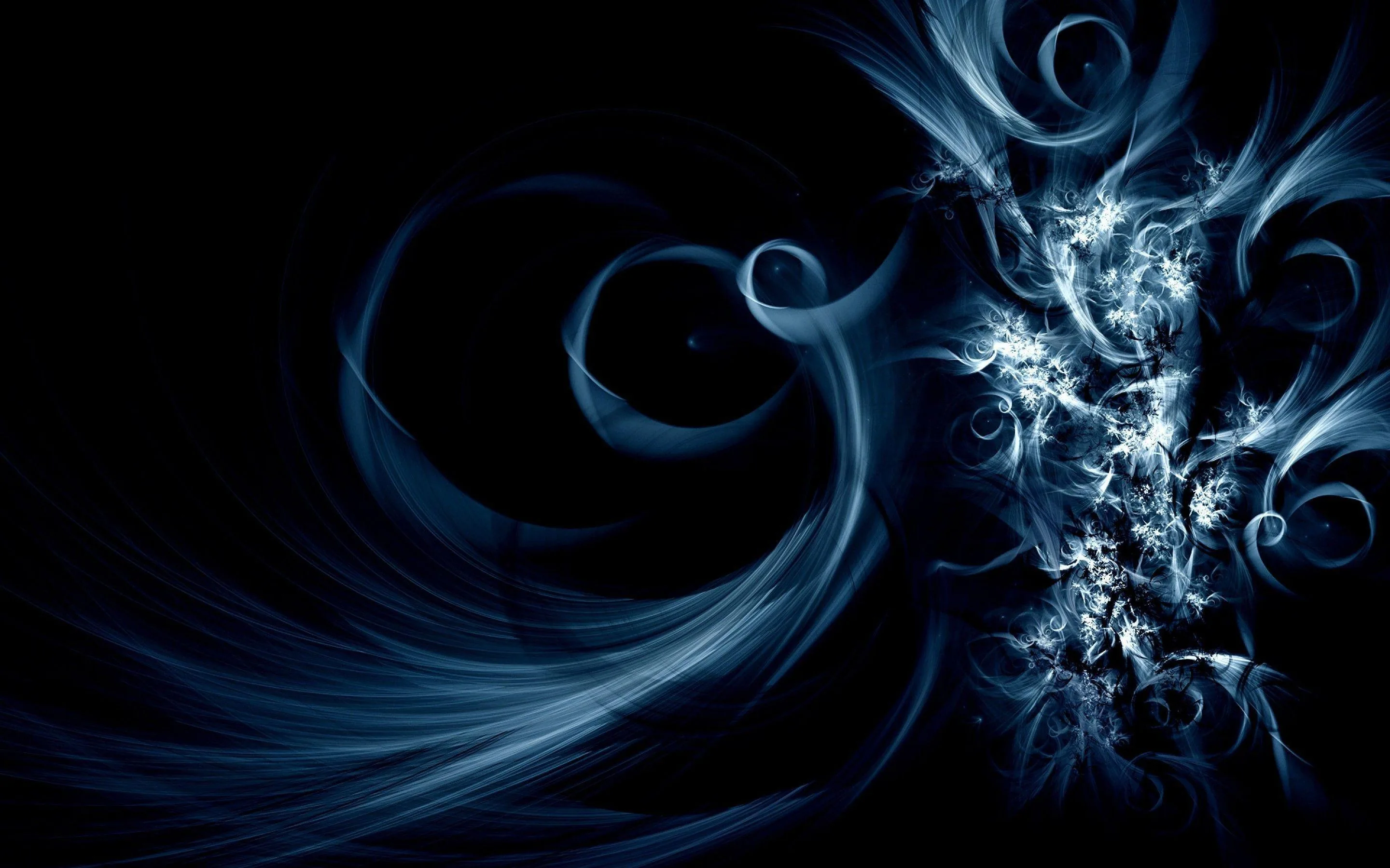 Thin ribbons of pale blue smoke curl in from the left while a bright crystalline burst breaks open on the right side of the black field.