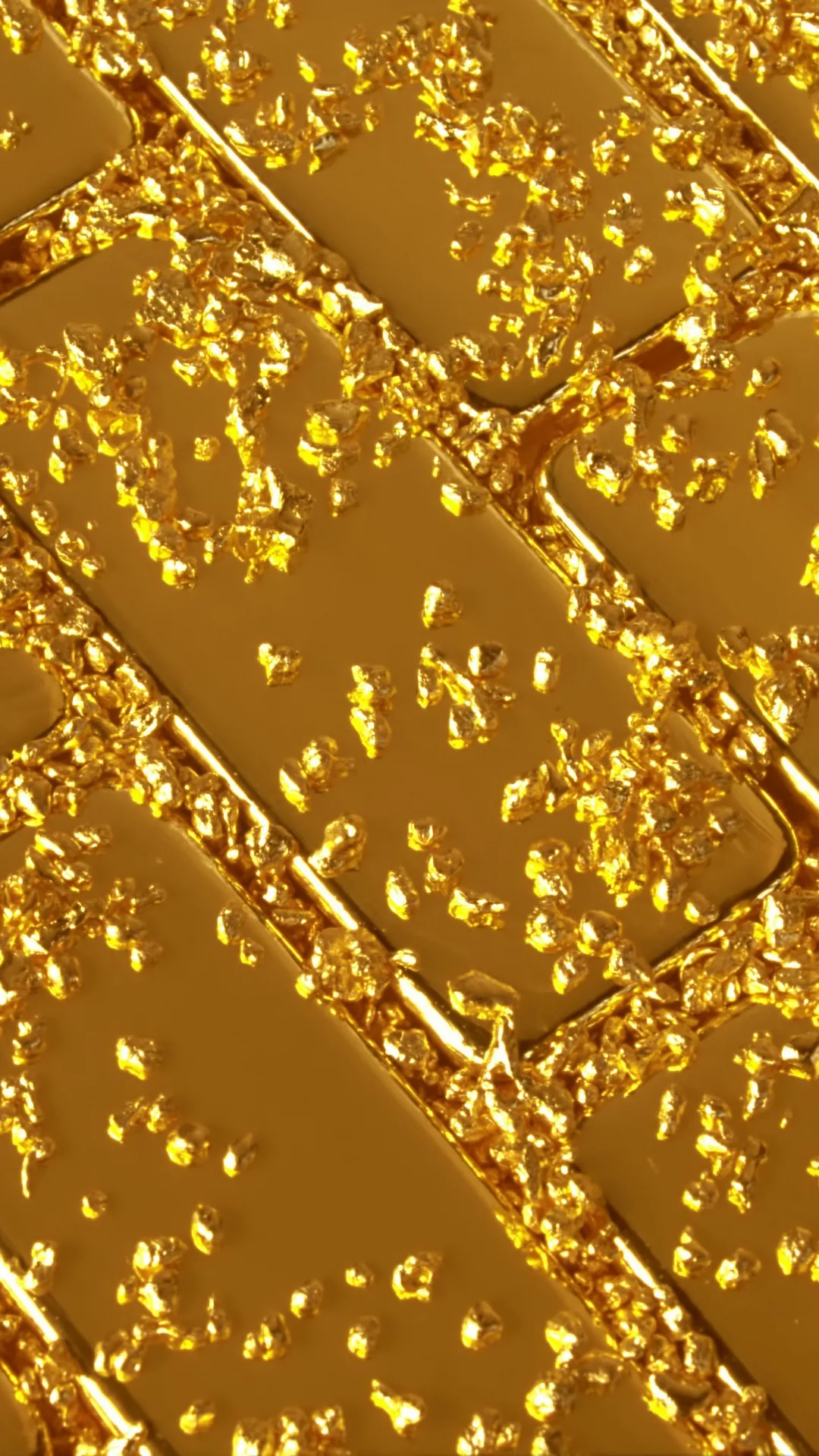 Polished gold bricks laid on a diagonal, strewn with loose foil flakes that catch the light in this tall phone-shaped frame.