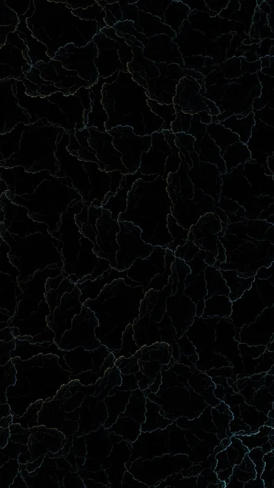 A web of hairline cracks lit in pale teal spreads across a black surface, thinning out toward the edges of the frame.